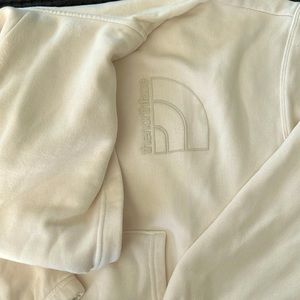 The North Face cream hoodie